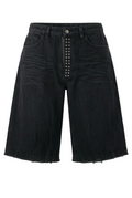 Black denim shorts with a unique front design featuring a prominent vertical row of silver studs down the center, a button closure, and a raw, frayed hem.