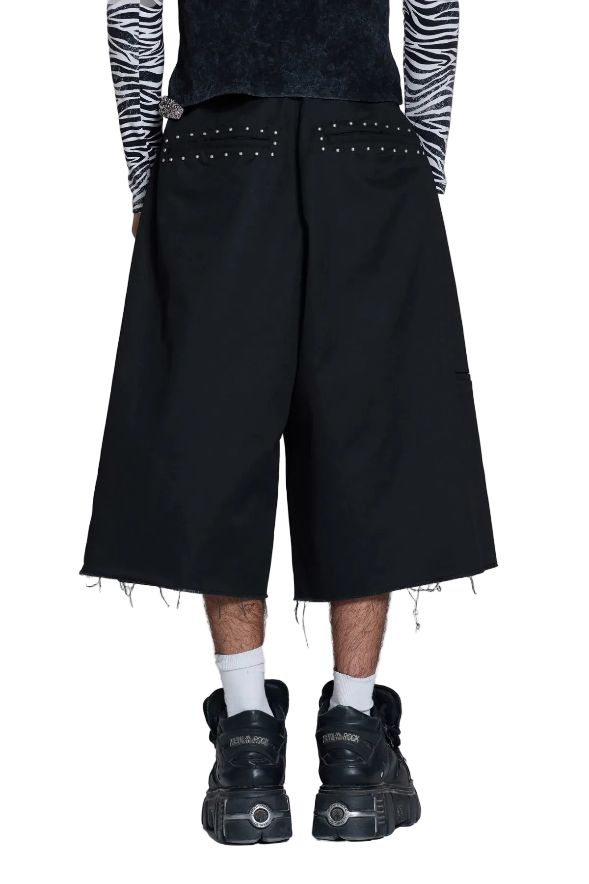 Black wide-leg cropped pants with silver stud detailing on the back pockets