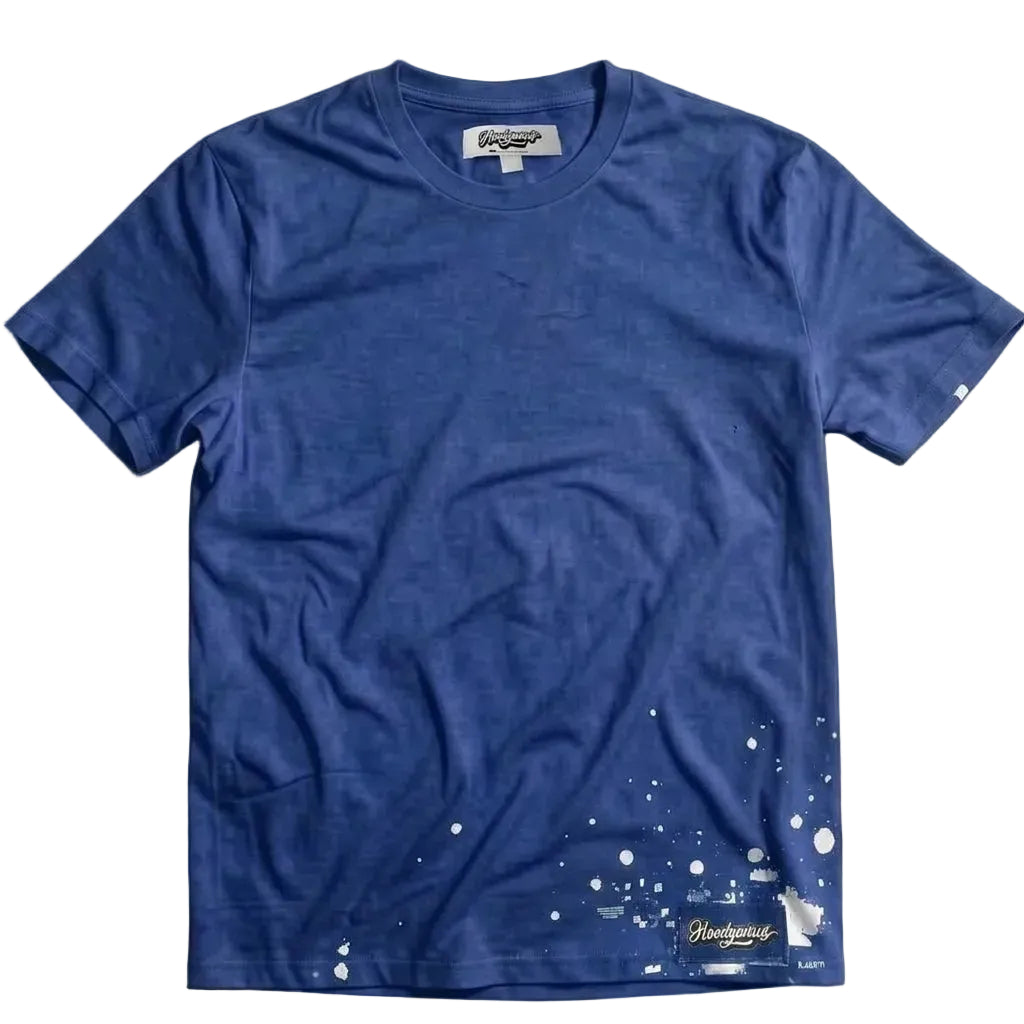 A blue short-sleeve crewneck t-shirt with white paint splatter graphics 